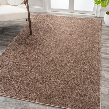 Haze Solid Low-Pile Area Rug Brown